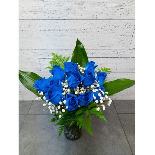 Beautiful arrangement of funeral flowers | Service Actuel